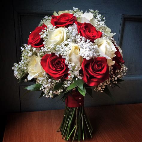 Classic white and red rose bouquet with gypsophila http://www ...