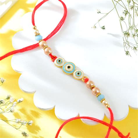 Send Set of Evil eye & Hamsa Rakhi for Brother Online - RKH24-113435 ...