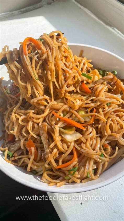 Easy Stir-Fried Rice Noodles - The Foodie Takes Flight