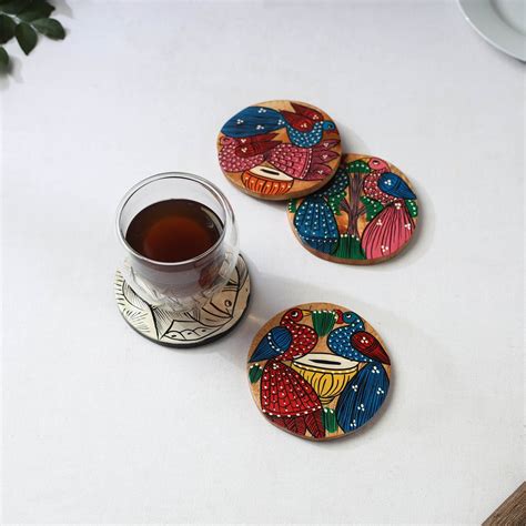 Multicolor Bengal Patua Handpainted Akashmoni Wooden Coasters (Set of 4)