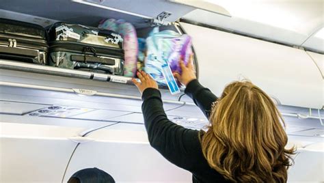 Flight passenger witnesses luggage buckled into 1st-class seat ...