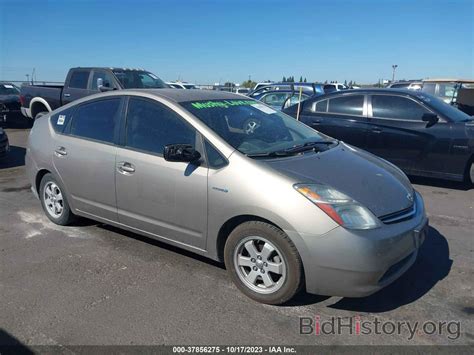 Report JTDKB20U573267001 TOYOTA PRIUS 2007 Beige Hybrid - price and damage history