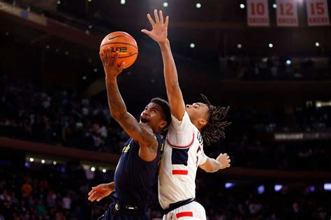 Download Basketball Jump Ball Action Shot Wallpaper | Wallpapers.com