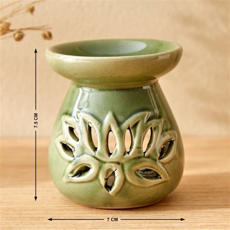 Buy Garnet Serene Ceramic Lotus Burner from Home Centre at just INR 129.0