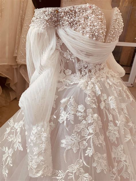 off the shoulder long sleeve wedding dress