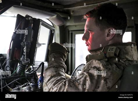 U.S. Marine Corps Lance Cpl. Truman Jackson, a data systems ...