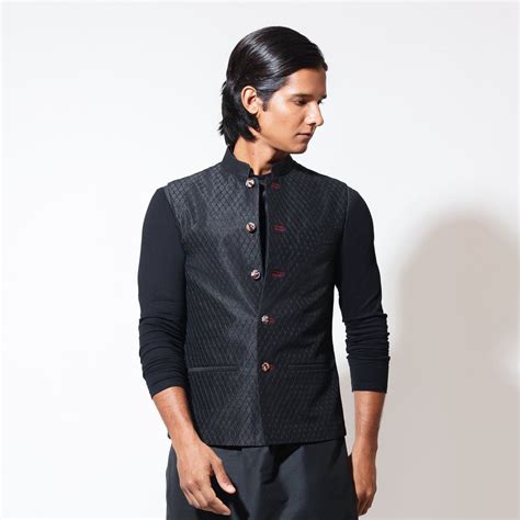 Sleeveless bandi with jaali embroidery and kalamkari buttons – Vivek ...