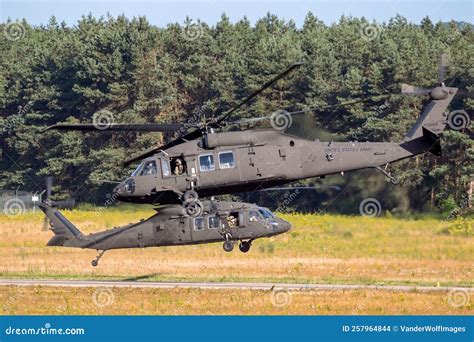 US Army Sikorsky UH-60 Black Hawk Helicopters Departing an Air Base in ...