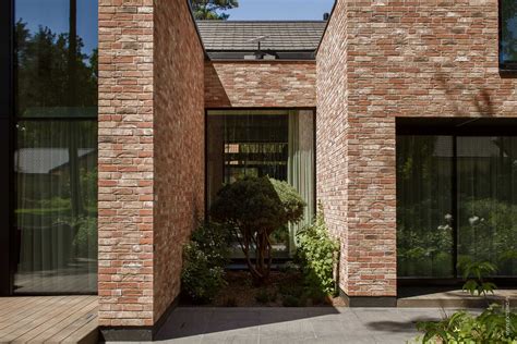 A Modern Brick Home Designed Around The Original Placement Of Trees ...