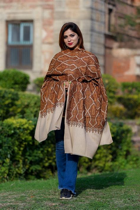 Very graceful steady beige color embroidered sozni shawl enriched