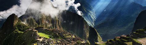 Download wallpaper the sun, clouds, rays, mountains, the city, fog ...