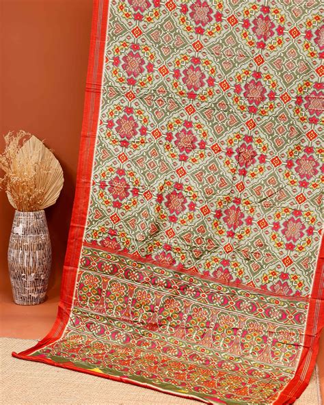 Handloom Ikkat Saree with Geometric Motifs & Elaborate Border - Multi