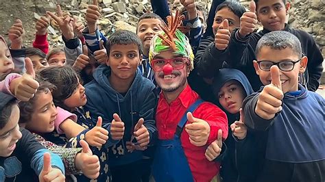 Palestinian clown brings smiles to children amid devastation in Gaza