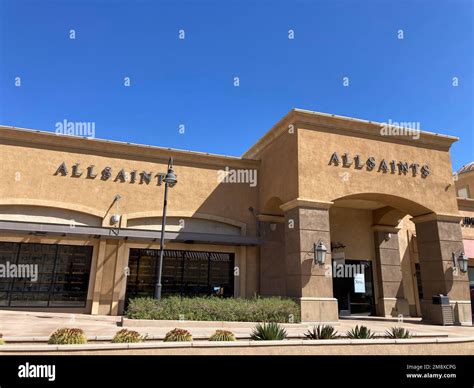 Allsaints sign, logo on the store facade at Desert Hills Premium ...