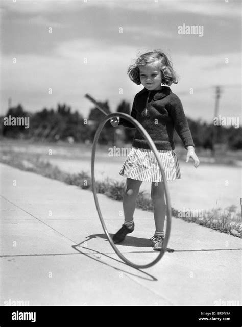 Stick and hoop hi-res stock photography and images - Alamy