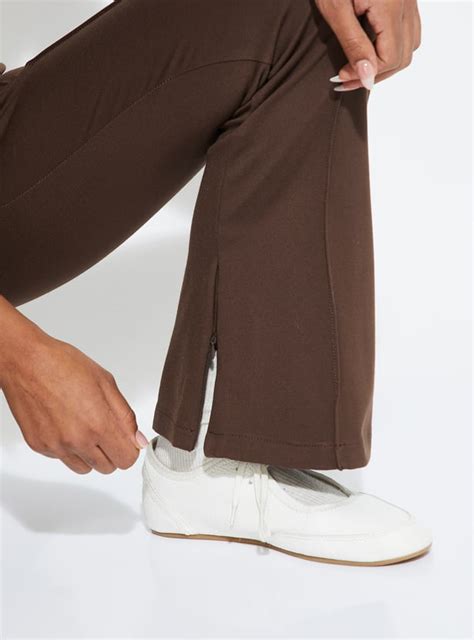 Buy Women Solid Kick Flare Trousers Online at just Rs. 1199.0 ...