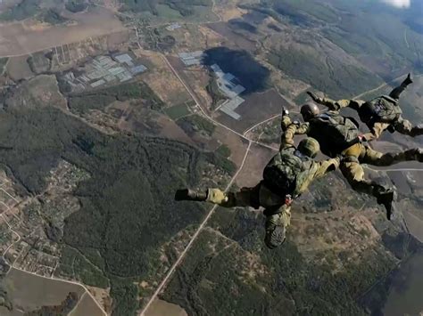 Russian National Guard Take to Skies for Heart-Pumping Skydiving Session
