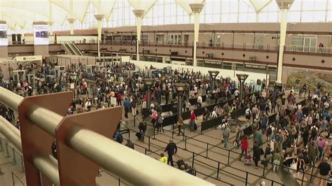 Travelers experience long security lines at DIA on October 1 | 9news.com