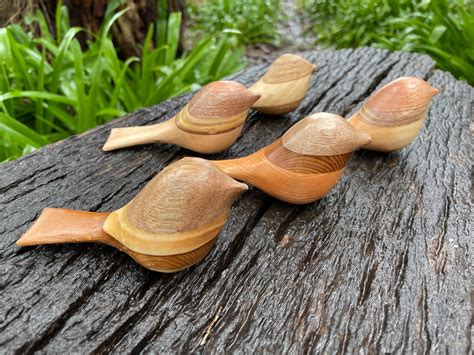 Carved Wooden Bird Figurine at Rose Hutchinson blog