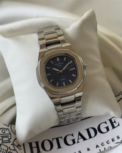 PP Nautilus - (Analog Watch)