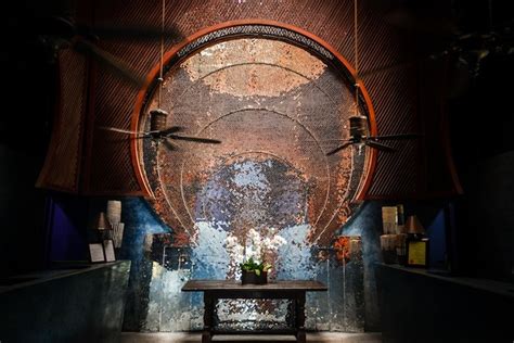 Temple at night illuminated with light from decorations