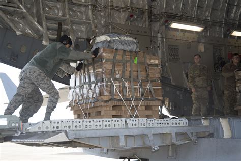 Airborne testers conduct airdrop tests of new container delivery system ...