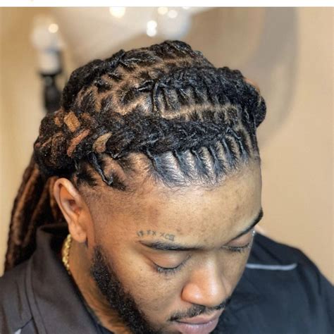 Pin by Denoltra Brown on Loc looks in 2025 | Dreadlock hairstyles for ...