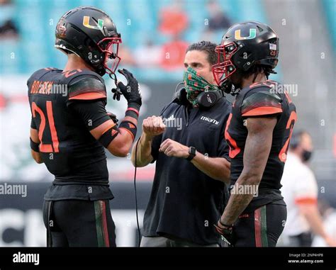 FILE - In this Dec. 12, 2020, file photo, Miami coach Manny Diaz talks ...