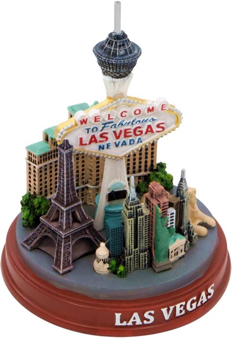 City-Souvenirs Las Vegas Sign and Statue with Skyline and Landmarks ...