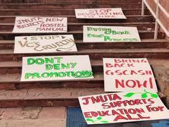 Posters expressing dissent over partial fee rollback put up across JNU