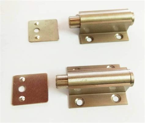 ONE10 Brass Glass Push Magnet Set of 2 Pcs. : Amazon.in: Home & Kitchen