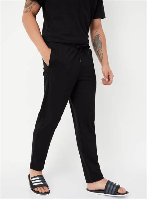 Buy Men Solid Track Pants Online at just Rs. 899.0 - 1000015174400 ...