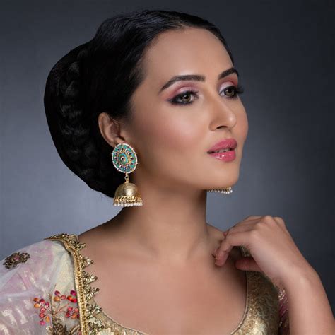 Sukkhi Resplendent Kundan Gold Plated Meenakari Pearl Jhumki Earring S ...