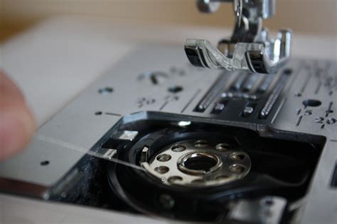 Image result for Loading Bobbin Singer