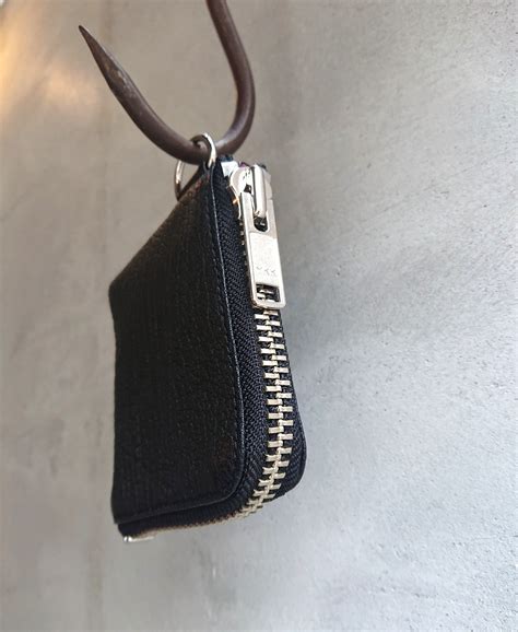 A PUZZLING HOME “ROCKERS WALLET" Buffalo Black Color | BOW & ARROW WEB ...