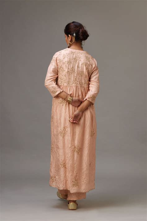 Pink silk hand crushed V neck gathered kurta set, highlighted with all ...