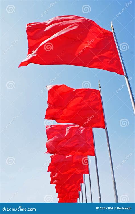 Red flags, yellow stars stock photo. Image of fabric, blue - 2347104