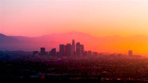 Download Stunning Los Angeles skyline at sunset | Wallpapers.com
