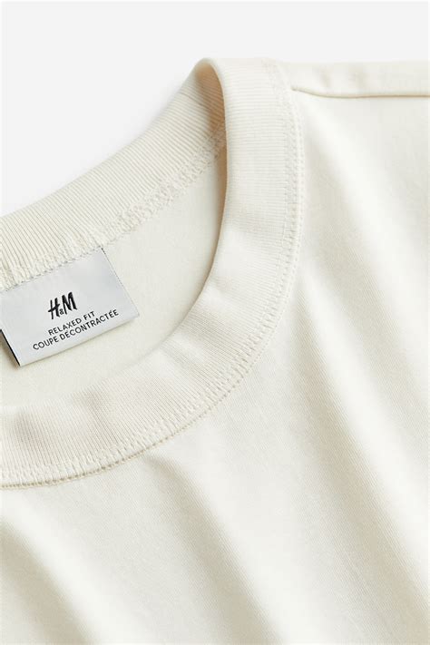 COOLMAX® Loose Fit T-shirt - Cream/Stones - Men | H&M IN