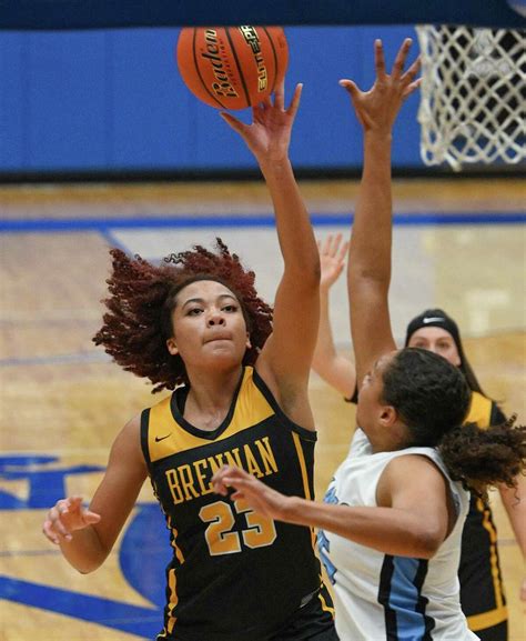 Girls basketball: Brennan toughs out overtime win over Harlan
