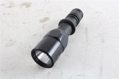 Image result for SureFire LED Flashlight