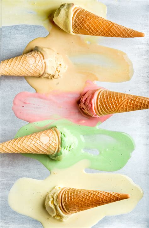 Colorful Ice Cream Cones Of Different Flavors. Melting Scoops. Top View ...