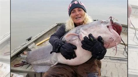 Woman catches 'monster' 88-pound catfish on Kentucky Lake, says it's a ...