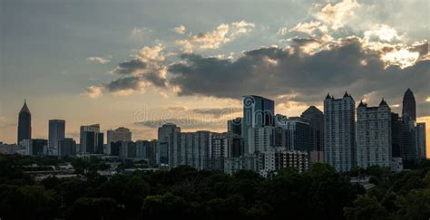 Atlanta Skyline during Sunset Stock Photo - Image of airplane, green ...