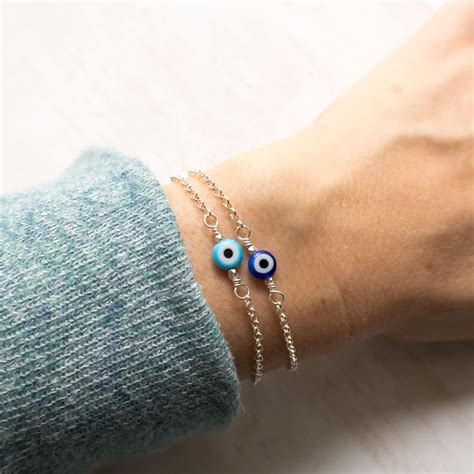 Arm Candy Blue Evil Eye Bracelet at Kenton Bridges blog