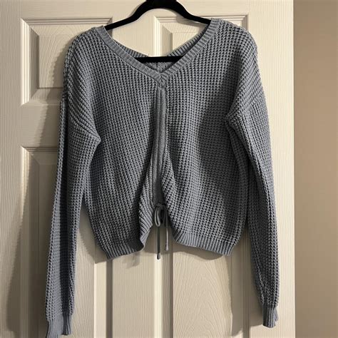 blue knit sweater tie on the front is adjustable so... - Depop