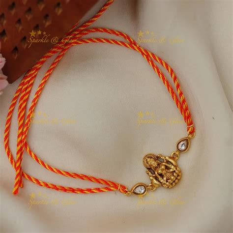 Elegance in Jadau Kundan Temple Rakhi for Festivals