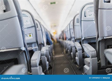Airline Passenger Seats and Aisle in Airplane Stock Image - Image of ...