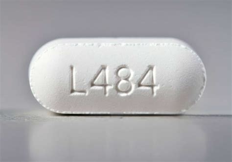 H49 White Oval Pill