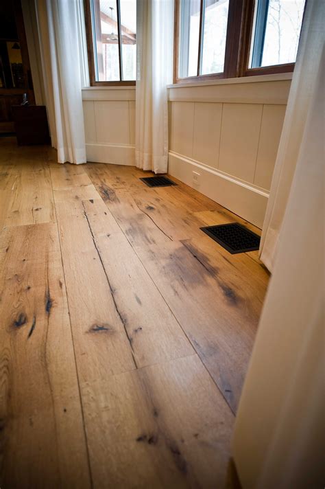 Wide Plank Barn Wood Laminate Flooring. Bathroom counter cabinets are ...